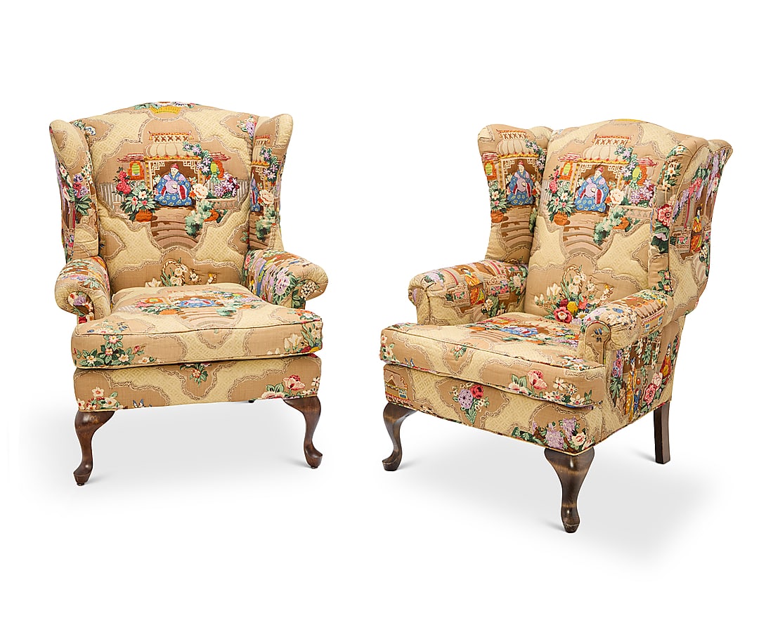A pair of George III style mahogany wing armchairs Late 20th century Each upholstered in a: A pair of George III style mahogany wing armchairs Late 20th century Each upholstered in a chinoiserie pictorial pattern fabric, raised on front cabriole legs 2 pieces Each: 43.25" H x 32.75" W x 36.5