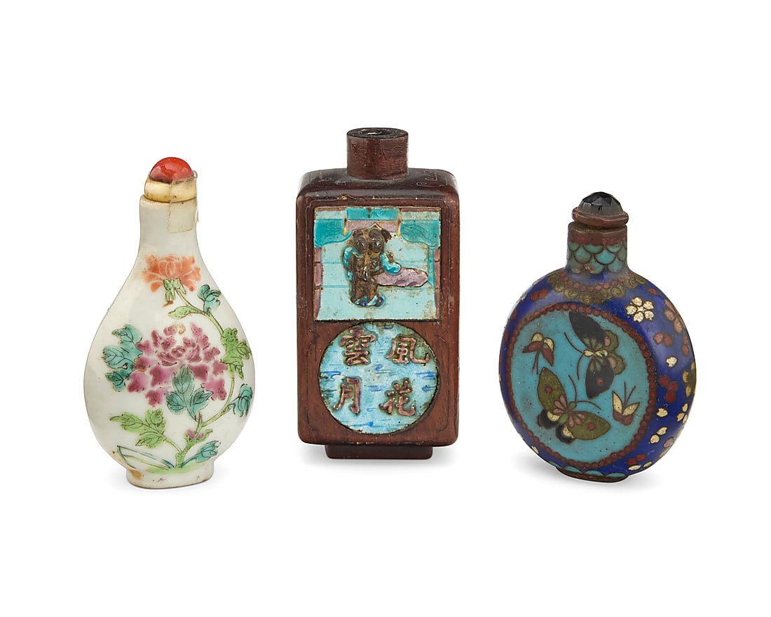 Three Chinese snuff bottles 20th century Comprising one porcelain decorated with floral motifs, (1 of 5)