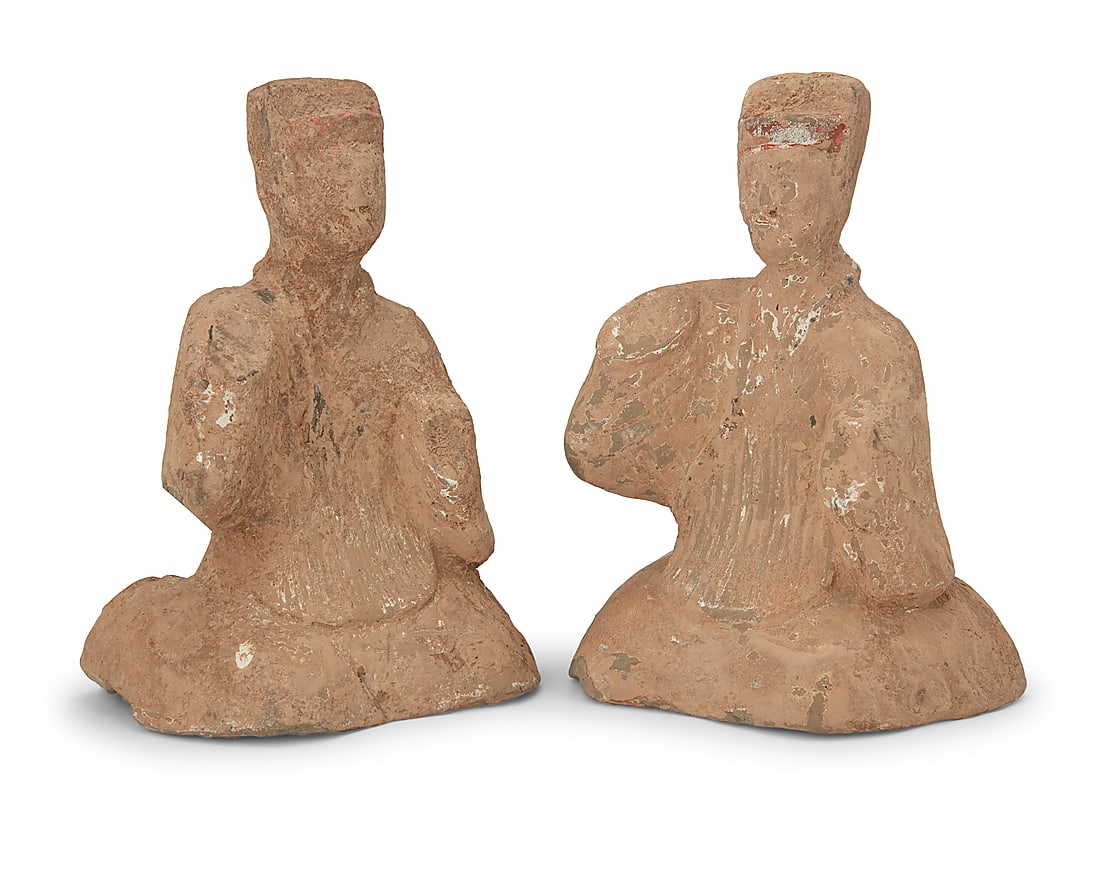 Two Chinese pottery figures of kneeling attendants Likely Han Dynasty (206 BCE-220 CE) or style 2: Two Chinese pottery figures of kneeling attendants Likely Han Dynasty (206 BCE-220 CE) or style 2 pieces Each: 6.375" H x 4.625" W 3.375" D approximately
