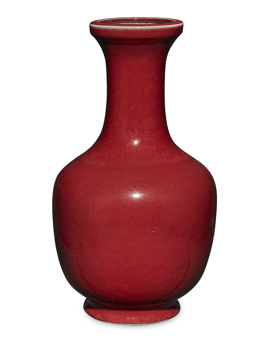 A Chinese oxblood porcelain vase 20th century Unmarked With tall neck and flared rim 13" H x (1 of 4)