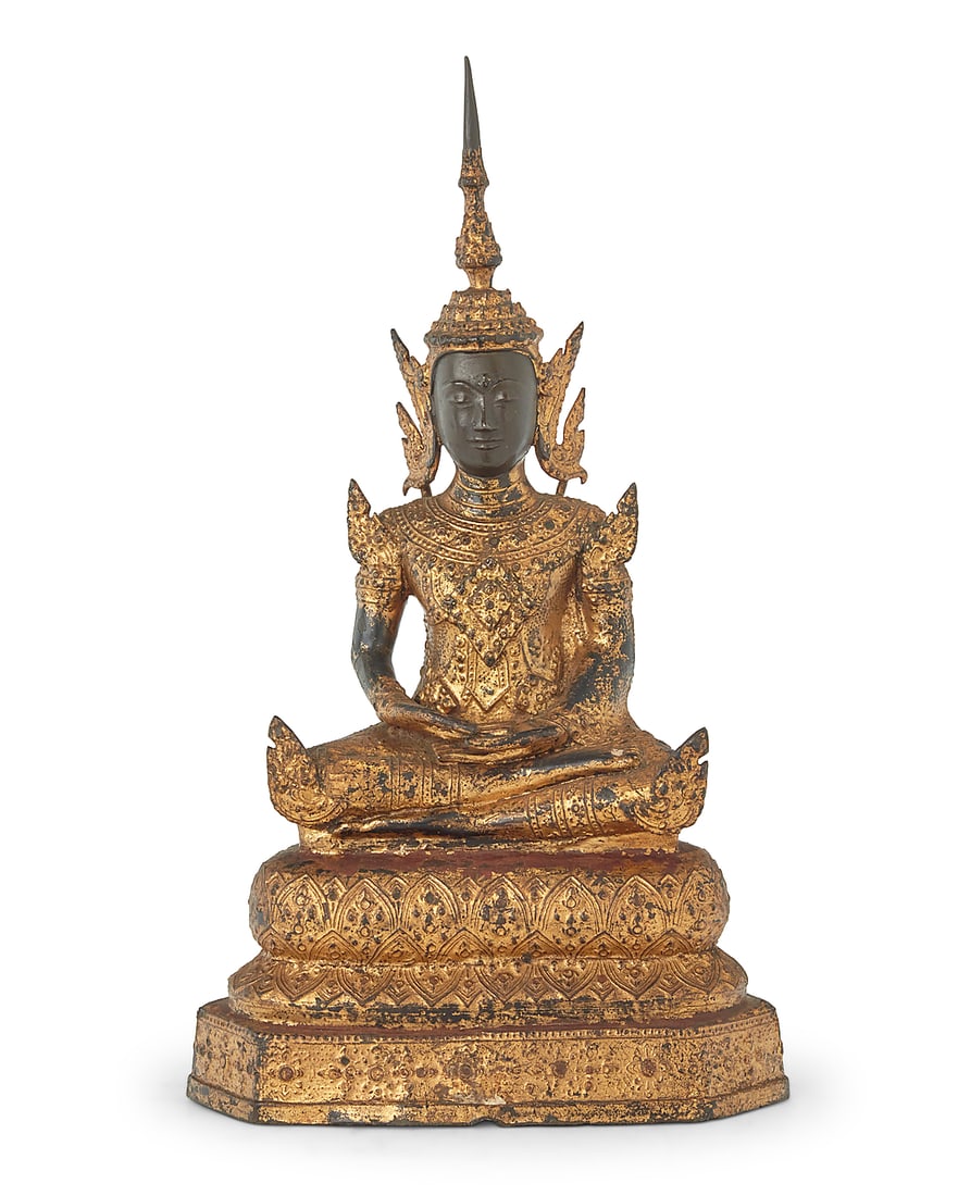 A Burmo Thai gilt metal Buddha figure: A Burmo Thai gilt metal Buddha figure Rattanakosin Period (1782-1932) With hands in dhyana mudra, seated on a tiered base 13.625" H x 7.5" W x 4.25" D
