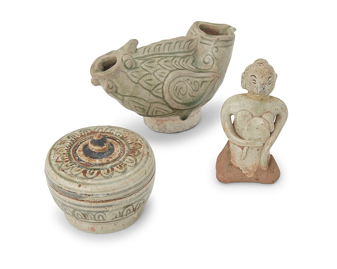 A group of Southeast Asian glazed pottery items 15th century or later Possibly Thai Sawankhalok: A group of Southeast Asian glazed pottery items 15th century or later Possibly Thai Sawankhalok wares, comprising a lidded jar, a bird-form effigy vessel, and a torso 3 pieces Bird: 3.5" H x 5.75" W x