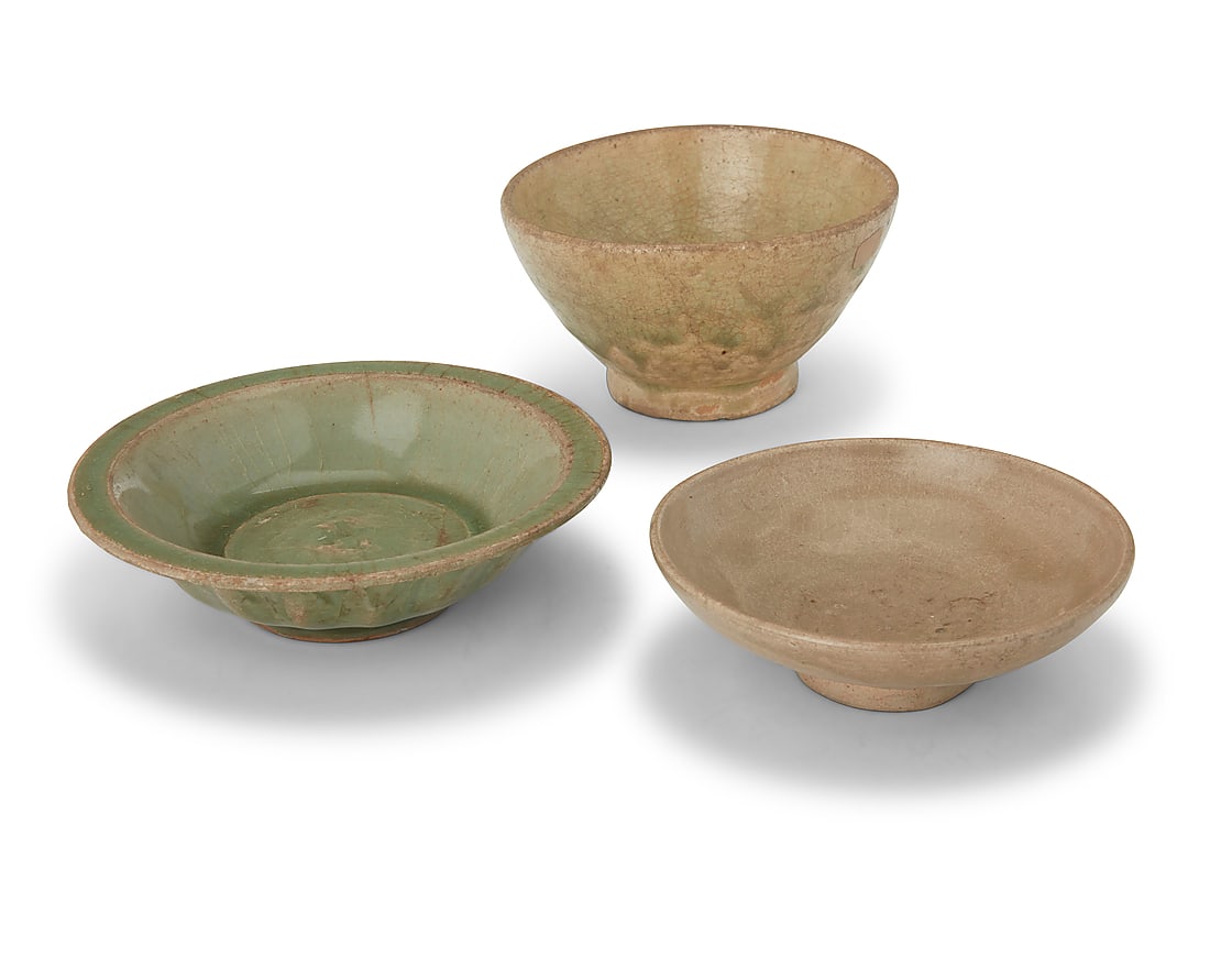 Three East Asian celadon ceramic bowls 15th century or later Possibly Chinese Longquan wares 3: Three East Asian celadon ceramic bowls 15th century or later Possibly Chinese Longquan wares 3 pieces Tallest: 2.375" H x 4.375" Dia.; Smallest: 1.375" H x 4.25" Dia.