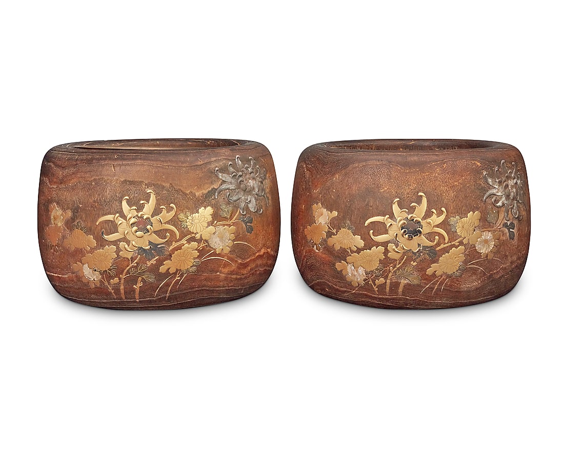 A pair of Japanese hibachis 20th century Each decorated with silver overlay, mother-of-pearl: A pair of Japanese hibachis 20th century Each decorated with silver overlay, mother-of-pearl inlay, and carved, painted, and gilt floral elements in relief, each with metal liner 2 pieces Each: 8.25" 