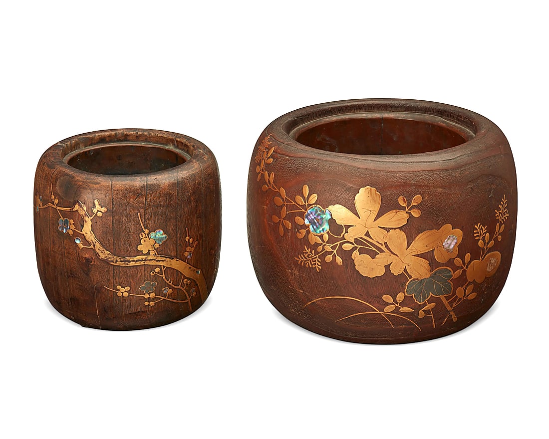 Two Japanese hibachis: Two Japanese hibachis Late Meiji Era (1868-1912) Each stamped with faint characters to underside The carved wood hibachis with copper lining, each adorned with inlaid mother of pearl and gilt-painted 