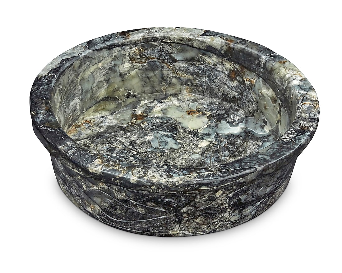 A Chinese carved hardstone fishbowl: A Chinese carved hardstone fishbowl 20th century With incised floral decoration to the exterior and lotus motif to the interior 5.5" H x 16.625" Dia. Provenance: Sold: Bonhams, Los Angeles, CA,