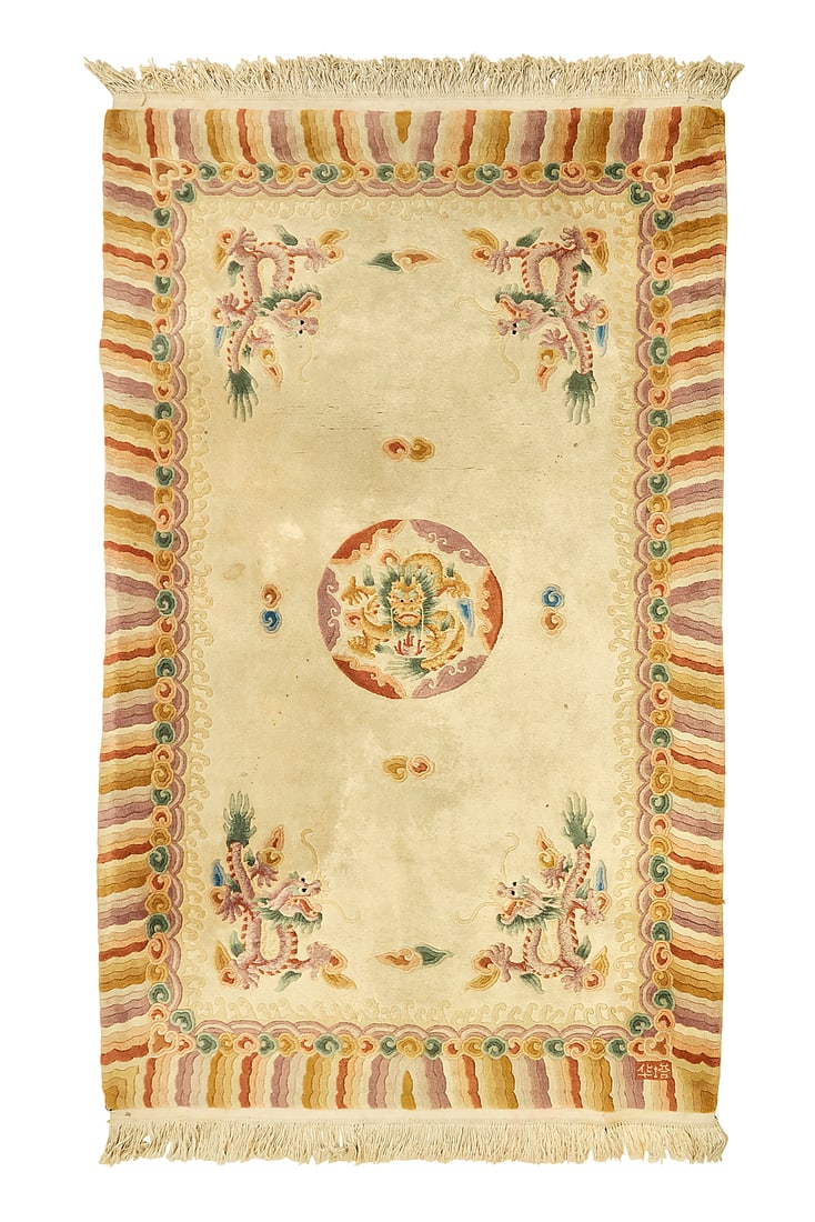 A Chinese rug: A Chinese rug 20th century Signed in the weaving at one corner; stamped verso Wool on cotton foundation 8' L x 5' W