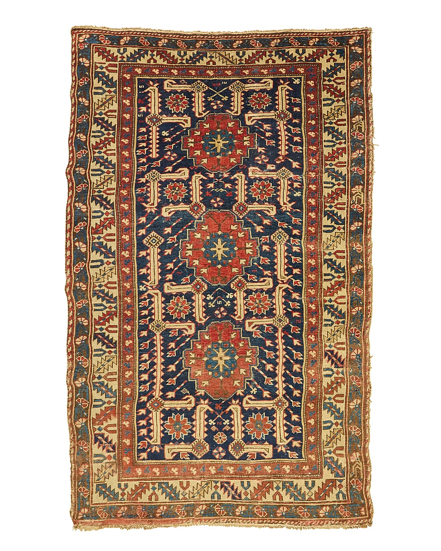 A Caucasian rug Early 20th century Wool on wool foundation 5' 5" L x 3' 5" W (1 of 3)