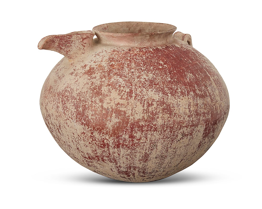 An Amlash beaked pottery jar: An Amlash beaked pottery jar Circa 8th-7th century BCE or later With flared rim, spout, and lug handle 9.5" H x 12" Dia.