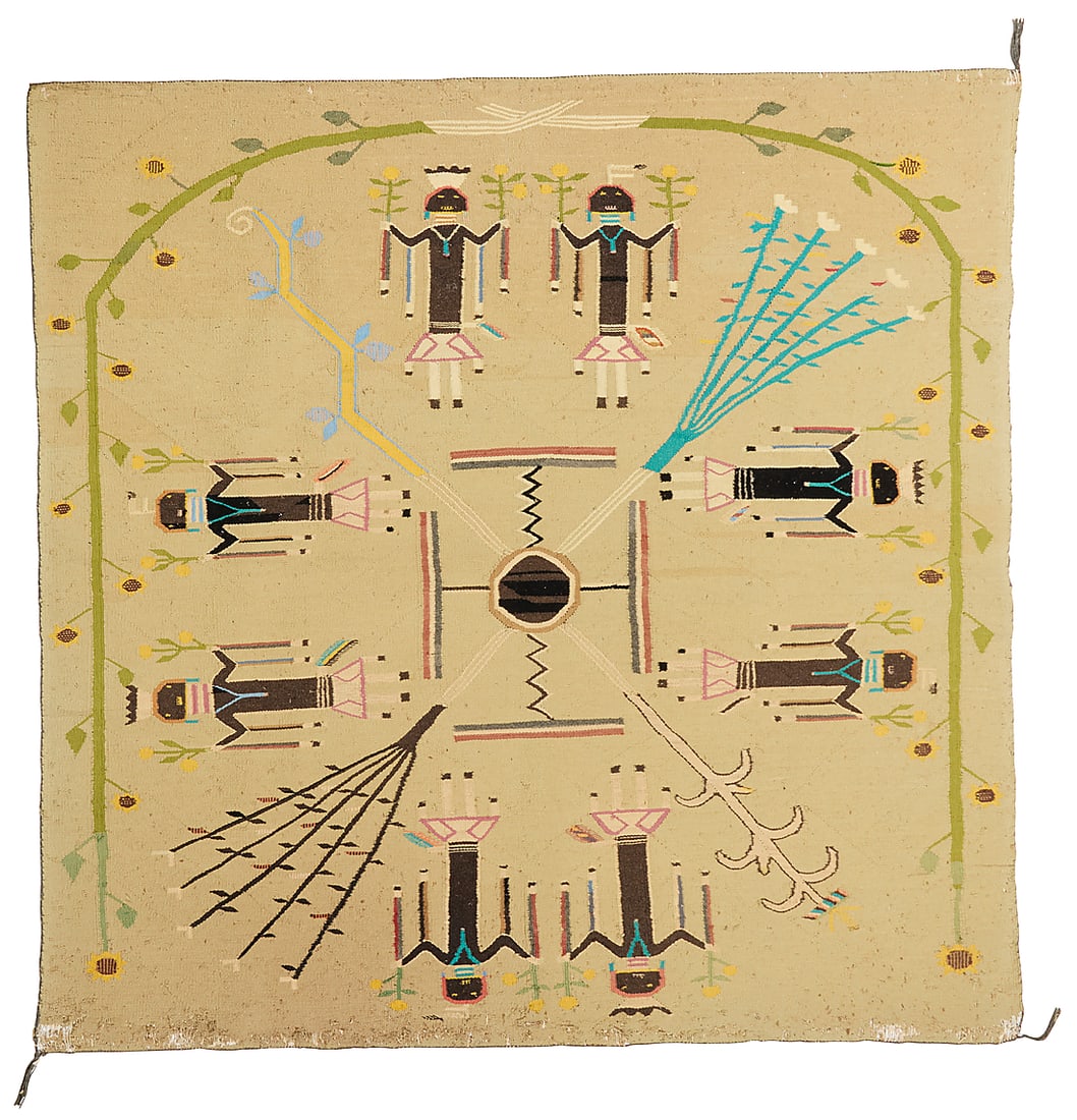 A Navajo sand painting style Yei textile: A Navajo sand painting style Yei textile Mid-20th century, Dine Woven in multicolor wool, with Yei figures depicted holding sunflowers, within a sunflower border 63" H x 63" W