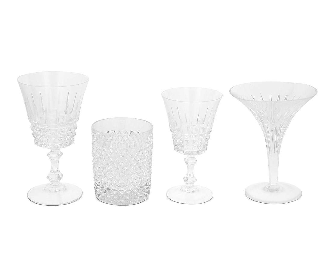 A group of glass stemware and tumblers: A group of glass stemware and tumblers 20th century Martini glasses marked illegibly to underside; others unmarked Comprising: 12 martini glasses (5.5" H x 4.5" Dia.) 9 cordial glasses (5.25" H x 3"