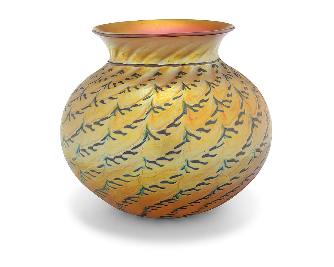 A Lundberg Studios iridescent glass vase: A Lundberg Studios iridescent glass vase 1997 Etched with dated and numbered to underside: Lundberg Studios / 0704139 With blue 'Indian Basket' pattern on a Favrile-style gold ground 8.75" H x 10"
