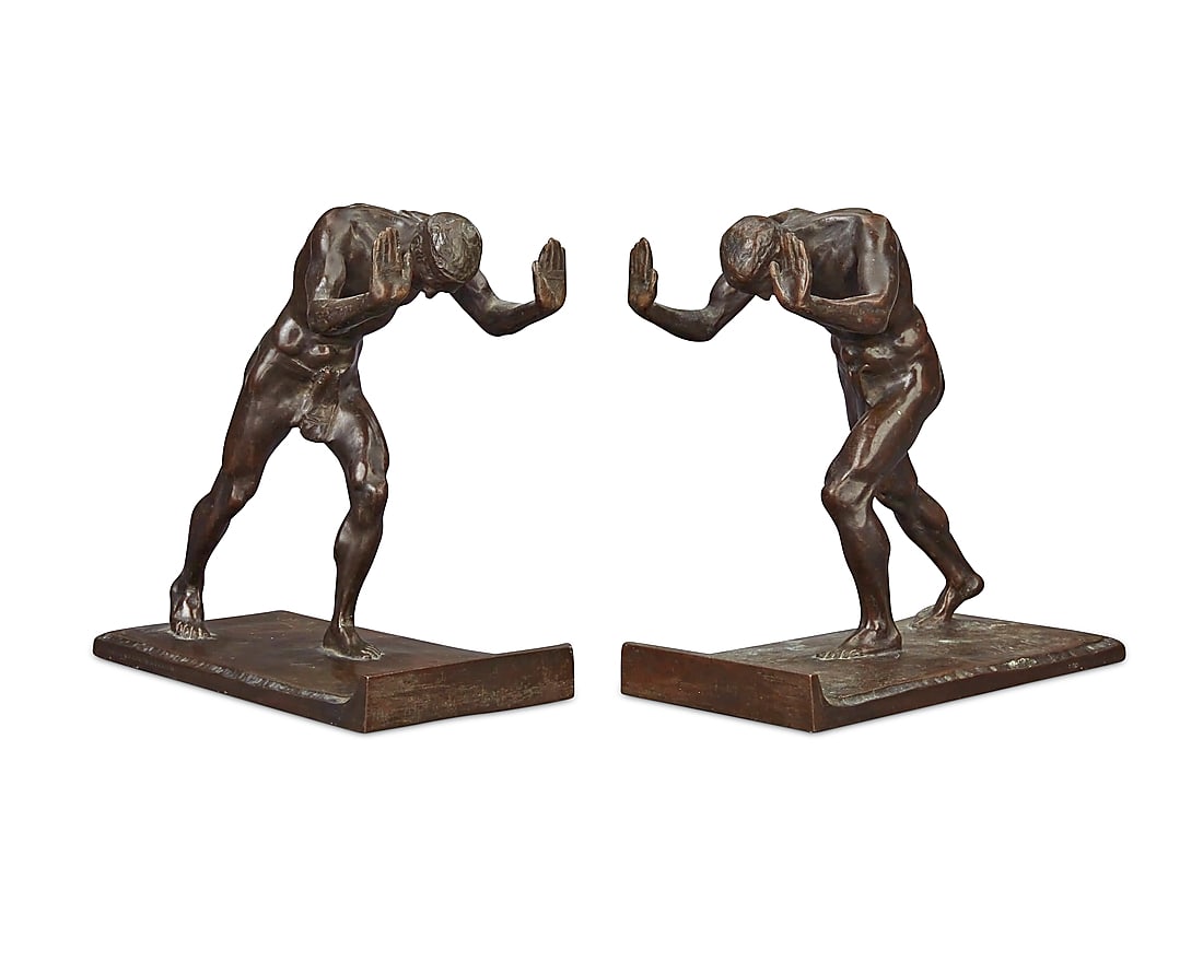 Isidore Konti (1862-1938), A pair of patinated bronze "Pushing Men" bookends, circa 1909 (1 of 7)