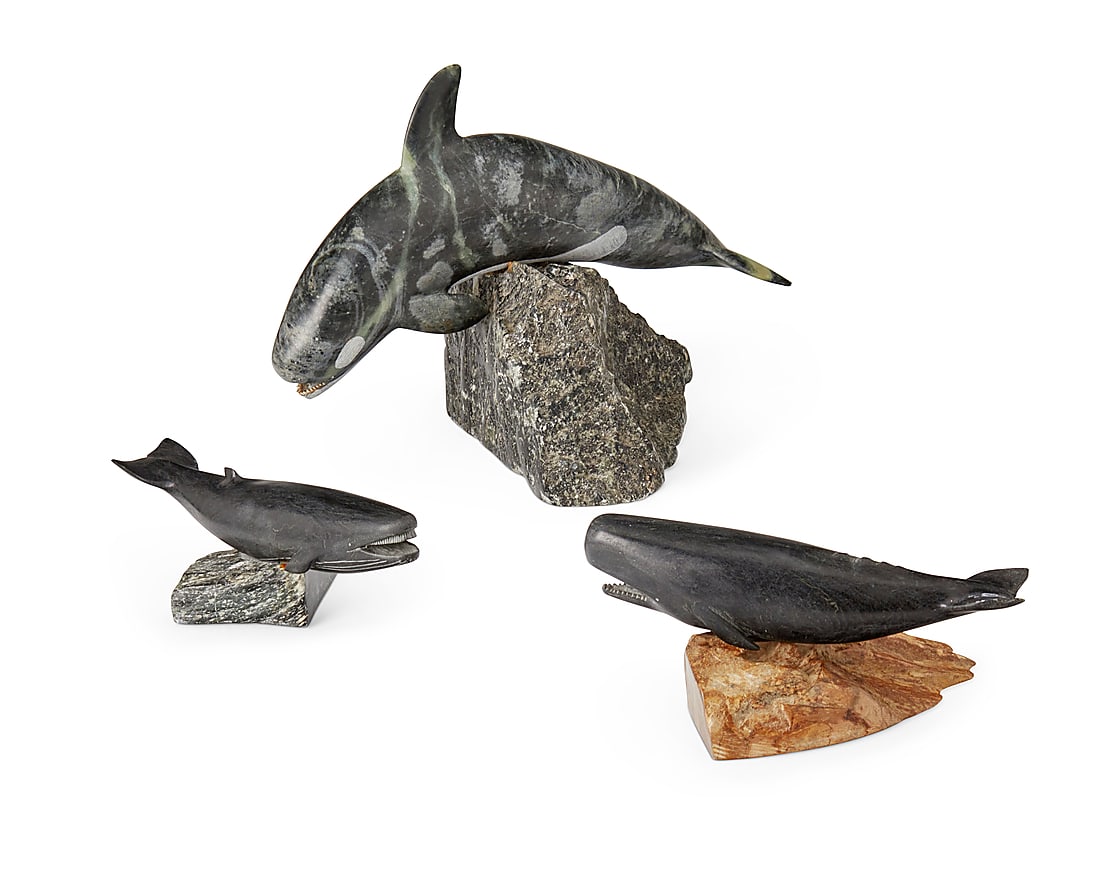 Three Inuit carved soapstone whale figures (1 of 4)