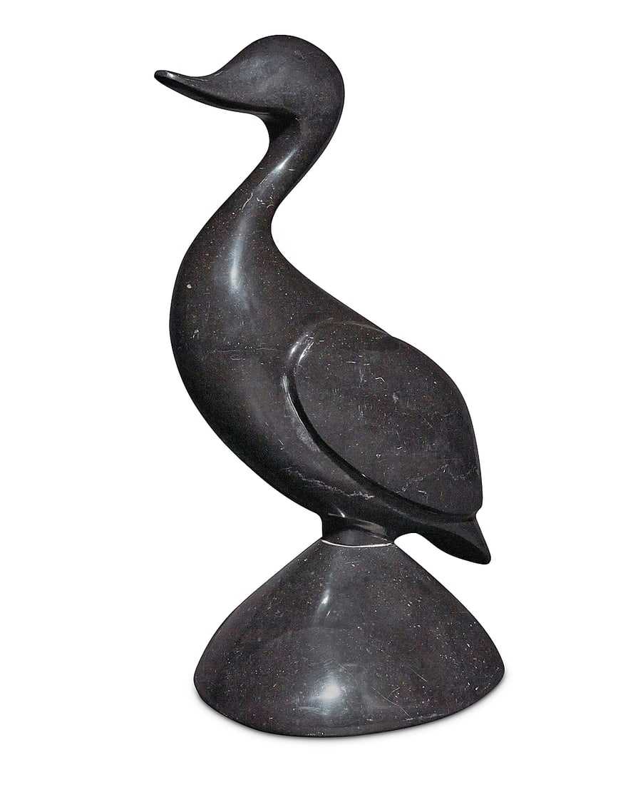 A carved hardstone model of a duck: A carved hardstone model of a duck 20th century Unmarked 15" H x 8.25" W x 6.25" D