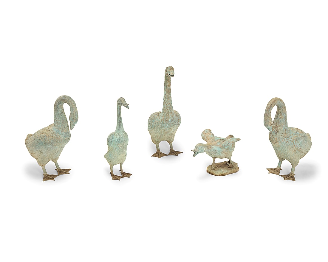 A group of five patinated bronze garden birds: A group of five patinated bronze garden birds Late 20th century Comprising three geese and two ducks 5 pieces Tallest geese: 26.25" H x 19" W x 9" D; Smallest duck: 9.5" H x 15.5" W x 11.25" D