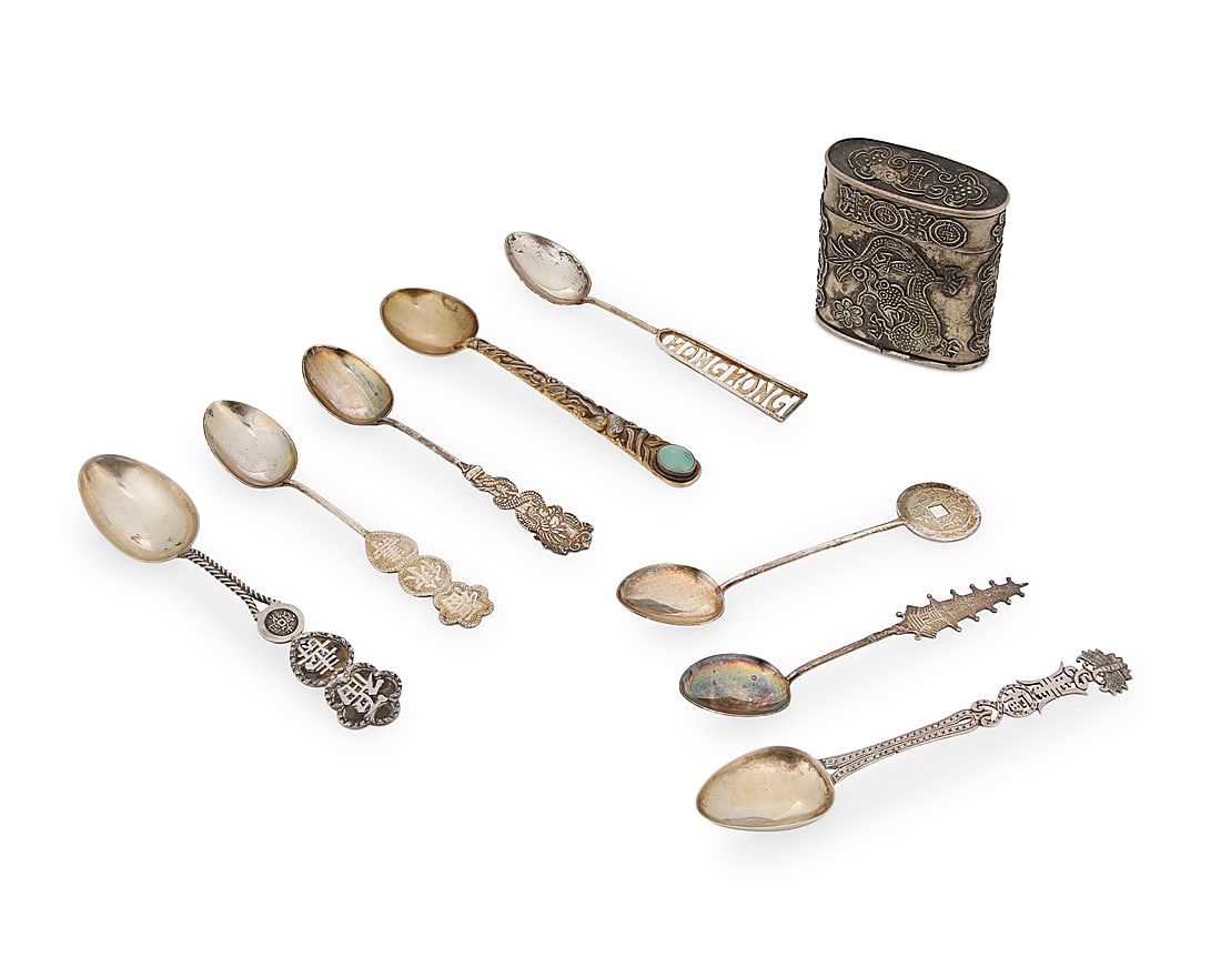 A group of Chinese silver spoons and a silver lidded box (1 of 2)