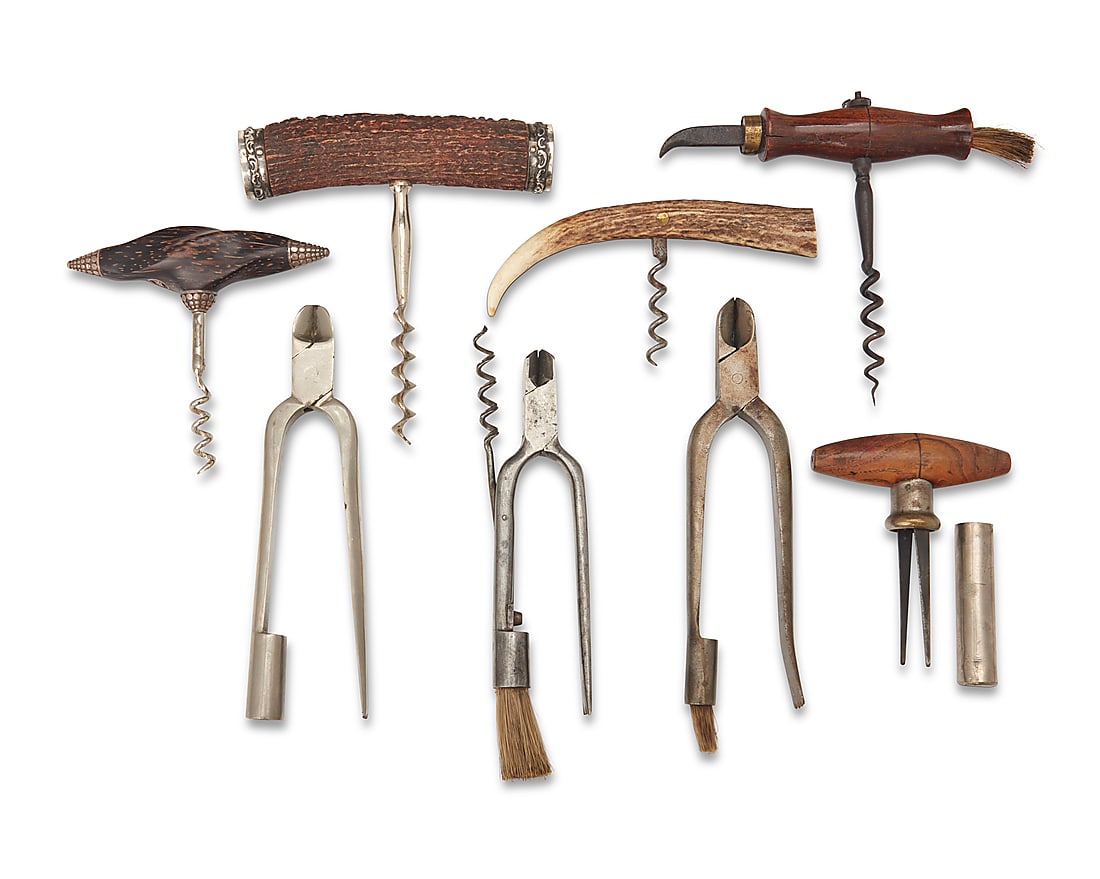 A group of bottle openers: A group of bottle openers Late 19th/early 20th century One antler marked to end cap for sterling and for Gorham; another marked: 925 Comprising three Victorian English champagne pliers, one cork pulle