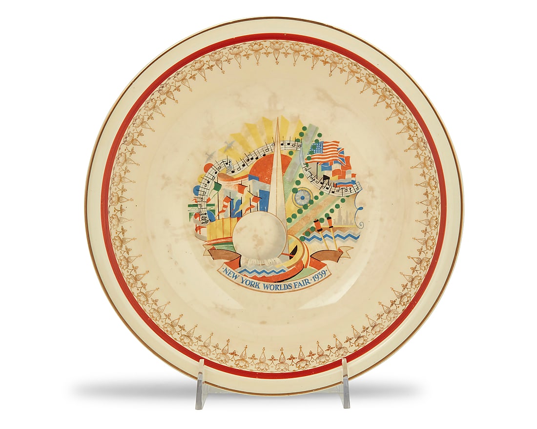 A Paden City Pottery 1939 New York Worlds Fair ceramic bowl: A Paden City Pottery 1939 New York Worlds Fair ceramic bowl Circa 1939 With factory commemorative stamp to underside 2.5" H x 10" Dia. Provenance: The Collection of Sybil Rosen and Robert Fisher