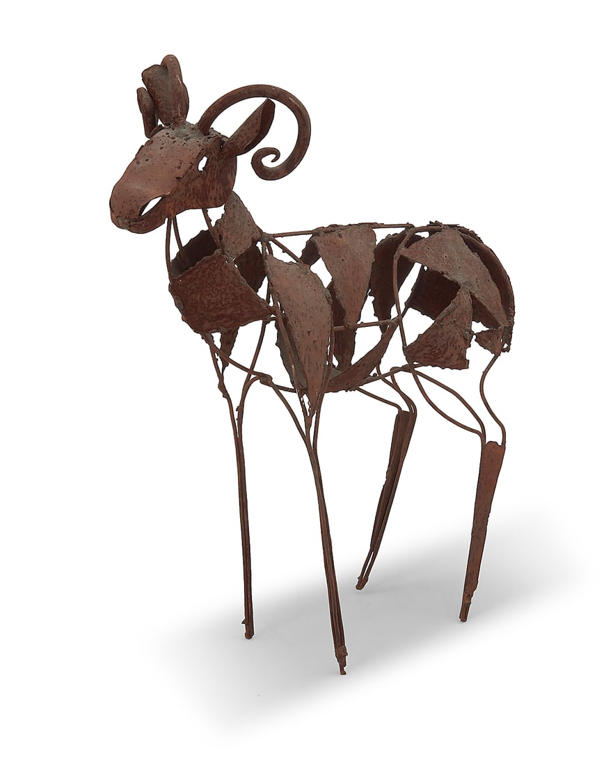 A wrought iron ram: A wrought iron ram 20th/21st century Unmarked 20" H x 16" W x 5" D