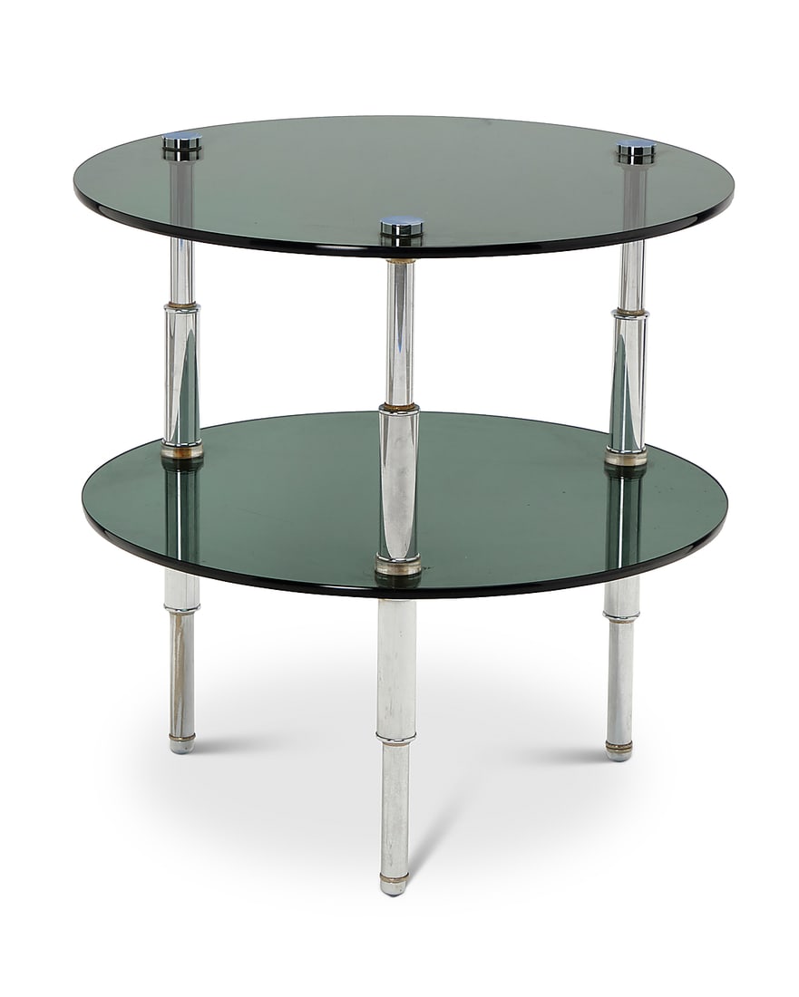 A Modern smoky glass and chrome tiered side table: A Modern smoky glass and chrome tiered side table Circa 1980s Unmarked The two circular glass tiers raised on chromed metal tubular supports 22.75" H x 22.125" Dia.
