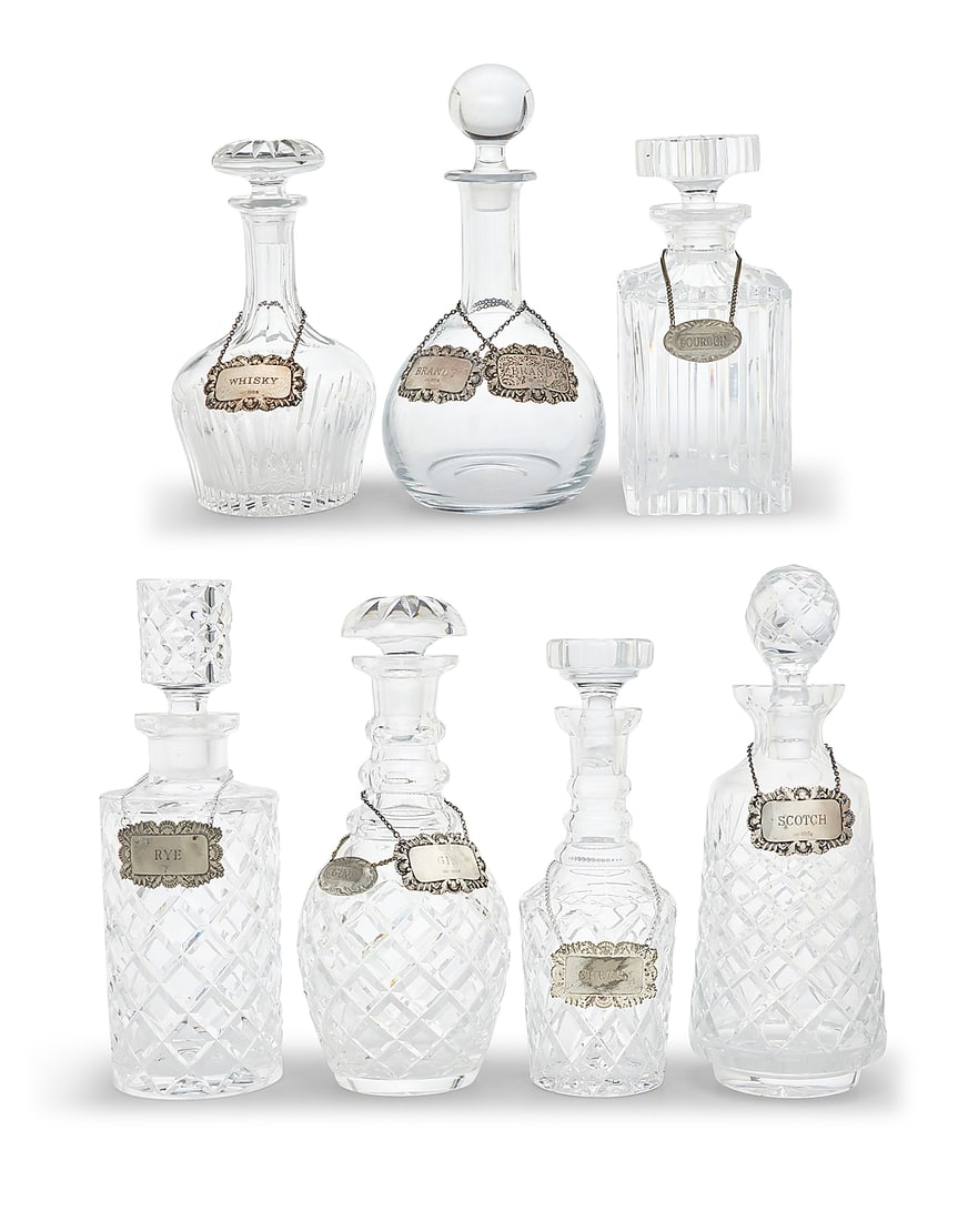 A group of seven cut glass decanters and five sterling silver tags (1 of 5)