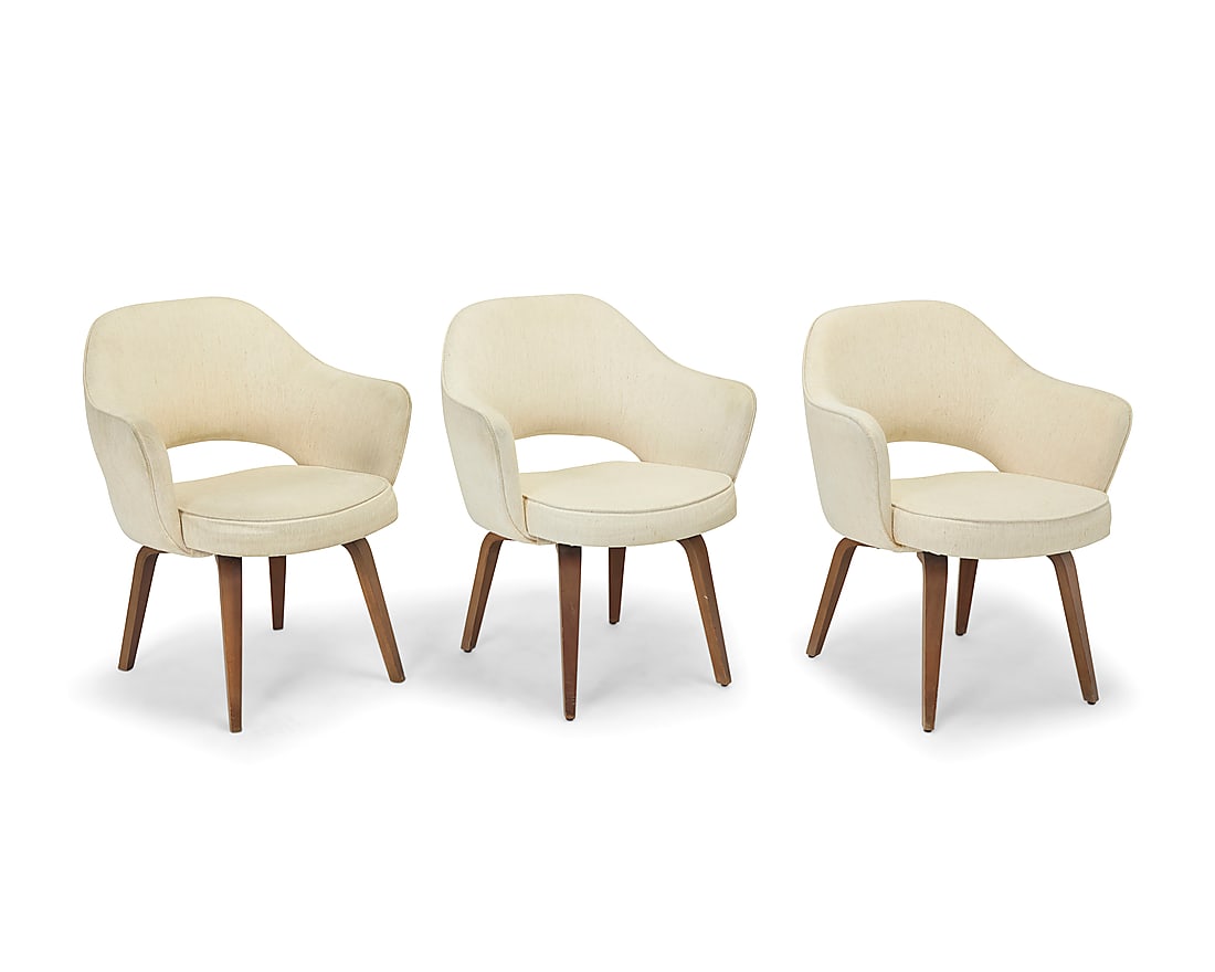 Eero Saarinen (1910-1961), A set of three armchairs model 71 for Knoll, mid-20th century: Eero Saarinen (1910-1961) A set of three armchairs model 71 for Knoll, mid-20th century Each unmarked With bentwood frames with canvas upholstery 3 pieces Height of each 32 in., width 26 1/4 in., dept