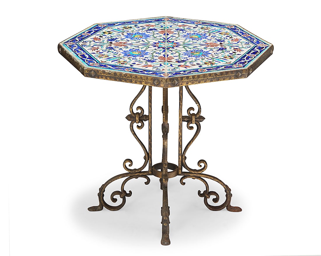 A Turkish tile top table: A Turkish tile top table 20th century With Iznik tiles and patinated brass base with scrolled feet Height 18 1/2 in., width 20 3/4 in., depth 22 in.