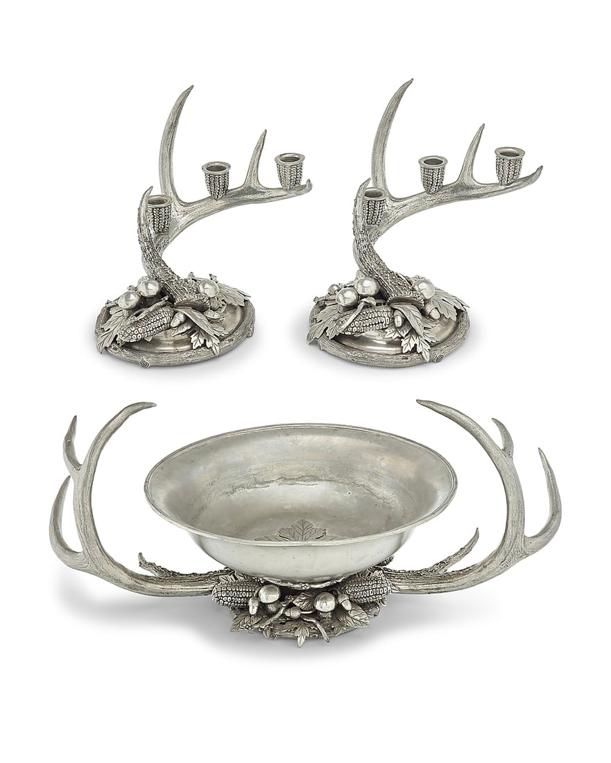 A Richard Cipolla pewter table garniture: A Richard Cipolla pewter table garniture Late 20th century Each impressed: CIPOLLA / PEWTER / 95% / [sun cipher] / ETAIN 95% Comprising a center bowl and pair of three-light candelabra, each of