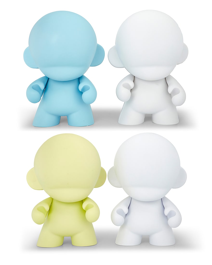 Four MUNNYWORLD 'Mega MUNNY' vinyl blank art toys by Kidrobot: Four MUNNYWORLD 'Mega MUNNY' vinyl blank art toys by Kidrobot 2020s Each with factory molded marks Comprising two white, one pale green, and one powder blue, each with articulated arms 4 pieces Each