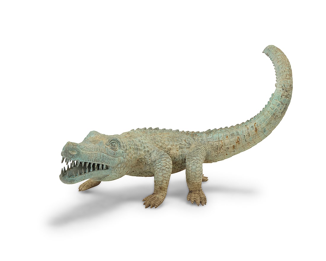 A patinated bronze model of an alligator (1 of 5)
