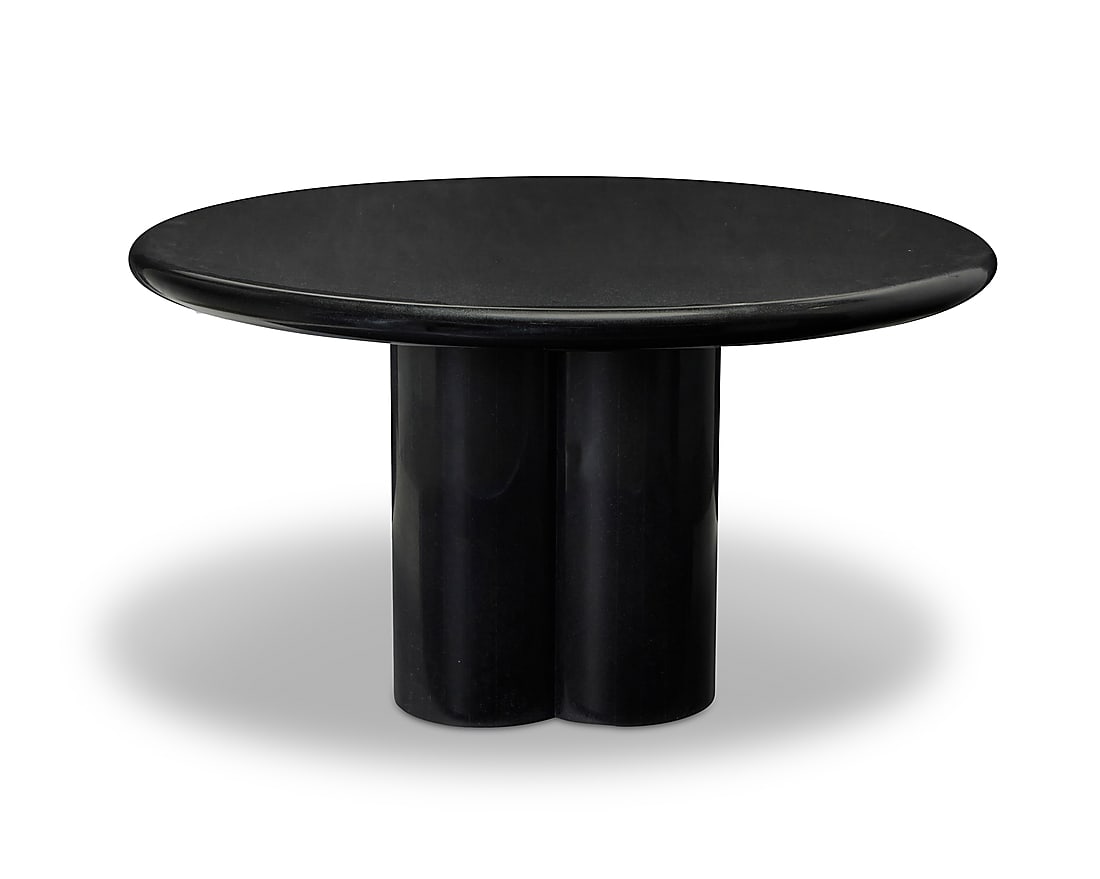 A Modern black marble circular table