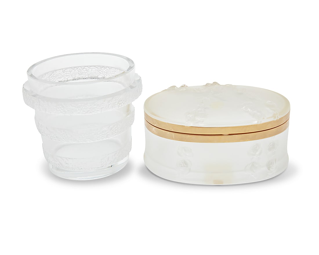 A Lalique glass 'Riquewihr' vase and 'Coppelia' vanity box: A Lalique glass 'Riquewihr' vase and 'Coppelia' vanity box Mid/late 20th century Vase etched: Lalique France; box etched: Lalique ® France; and with applied label: BOITE COPPELIA / 10578 / MADE IN FR