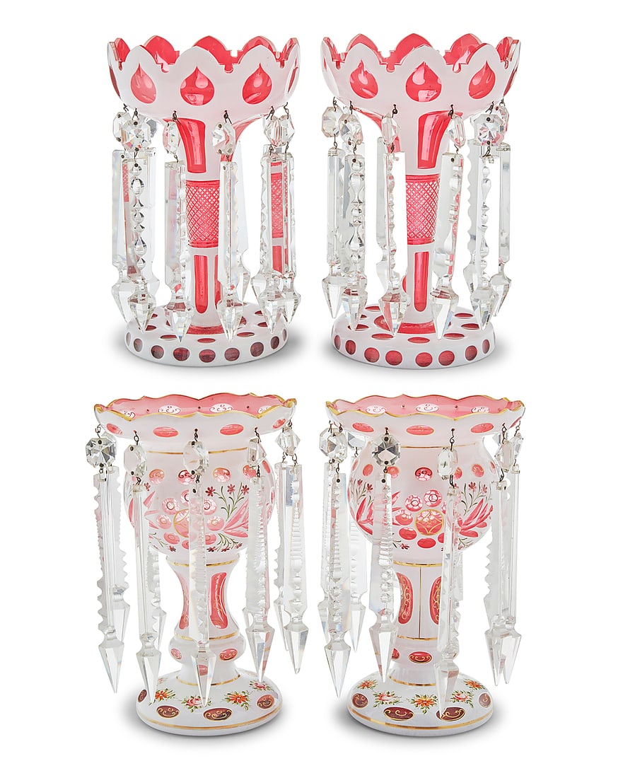 Two pairs of Bohemian overlaid cranberry glass lusters: Two pairs of Bohemian overlaid cranberry glass lusters Late 19th/early 20th century Each unmarked Mounted with cut glass drop elements, one pair painted with floral decoration and gilt accents 2 piece