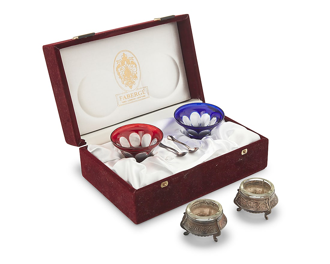 A pair of Faberge overlay glass open salt cellars: A pair of Faberge overlay glass open salt cellars Late 20th century Each glass etched: Faberge; each spoon unmarked, XRF tested for sterling; associated holders marked: [SYUMET] / [indecipherable] 30K