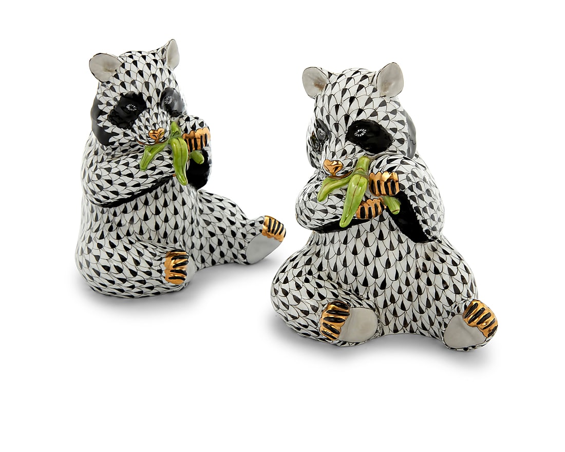 A pair of Herend porcelain black fishnet panda bears: A pair of Herend porcelain black fishnet panda bears Late 20th century Each with blue printed factory mark above painted numbers: 15348 / VHNM / E 97 2 pieces Height of each 5 in., width 4 1/4 in.,