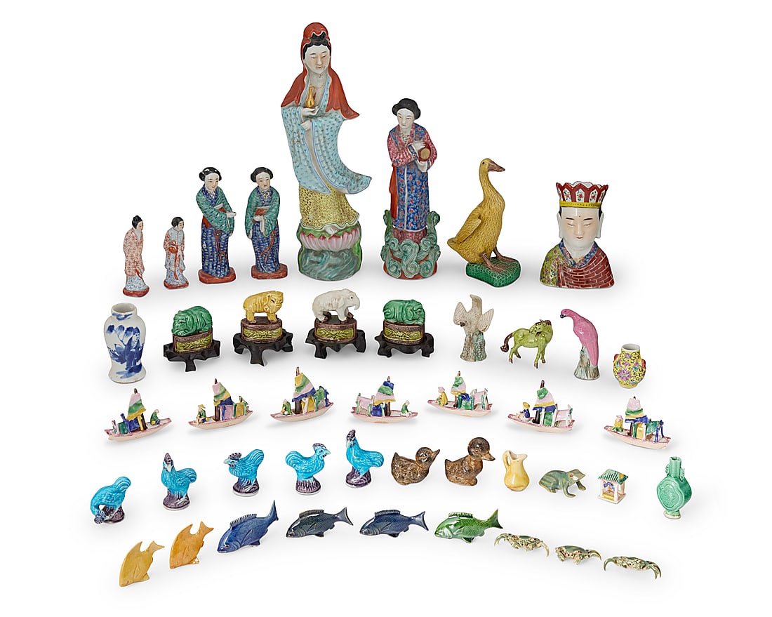 A large group of Chinese glazed ceramic figures: A large group of Chinese glazed ceramic figures 20th century Most impressed or stamped: CHINA; a few of the larger also impressed with maker's mark or apocryphal reign mark Comprising six figures of w