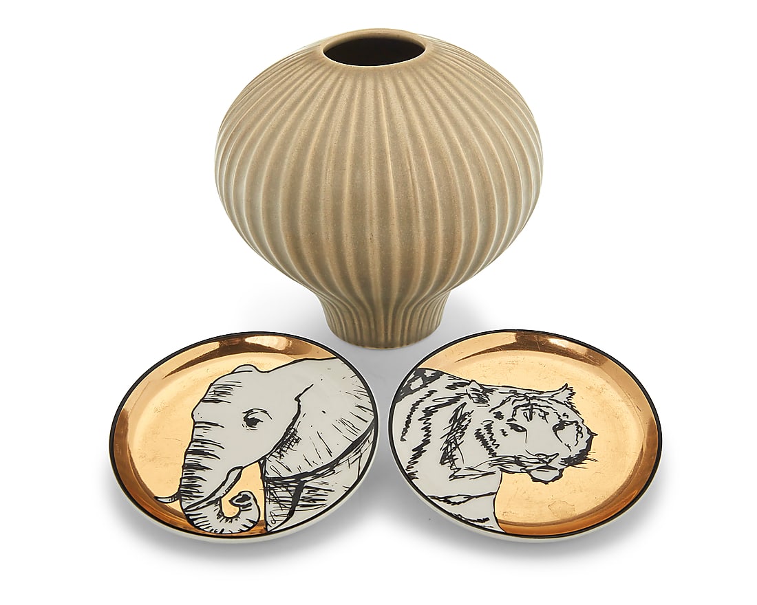 Three Jonathan Adler ceramic table items: Three Jonathan Adler ceramic table items Late 20th/early 21st century Each stamped or printed with factory mark Comprising a glazed ceramic 'Pot-Au-Porter' lantern vase and two parcel-gilt coasters fr
