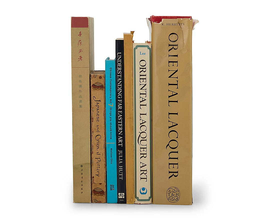 A group of Asian art books: A group of Asian art books 20th century Comprising hardcover and softcover books on subjects including Asian lacquer, ceramics, contemporary art, and general art topics 7 pieces Largest height 12 1/4 