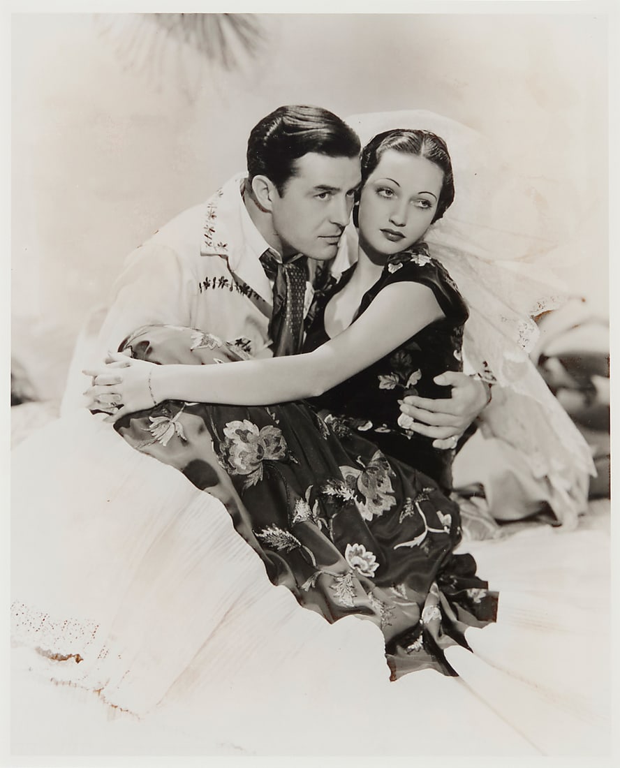 George Hurrell (1904-1992), A portrait of Johnny Mack Brown and Dorothy Lamour: George Hurrell (1904-1992) A portrait of Johnny Mack Brown and Dorothy Lamour Photograph on paper From the edition of unknown size and date Appears unsigned Image: 9 1/2 x 7 1/2 in.