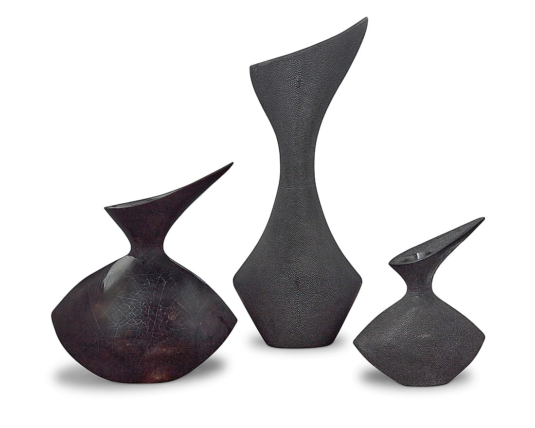 Three R & Y Augousti sculptural vases: Three R & Y Augousti sculptural vases Early 21st century Each stamped with factory mark Wood and overlay, the largest and smallest each in shagreen, the middle in pen shell 3 pieces Tallest height 23
