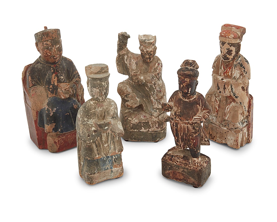 Five Chinese polychrome carved wood figures: Five Chinese polychrome carved wood figures Qing dynasty (1644-1912) or later 5 pieces Largest height 8 1/8 in., width 3 3/4 in., depth 2 7/8 in.; smallest height 7 3/8 in.