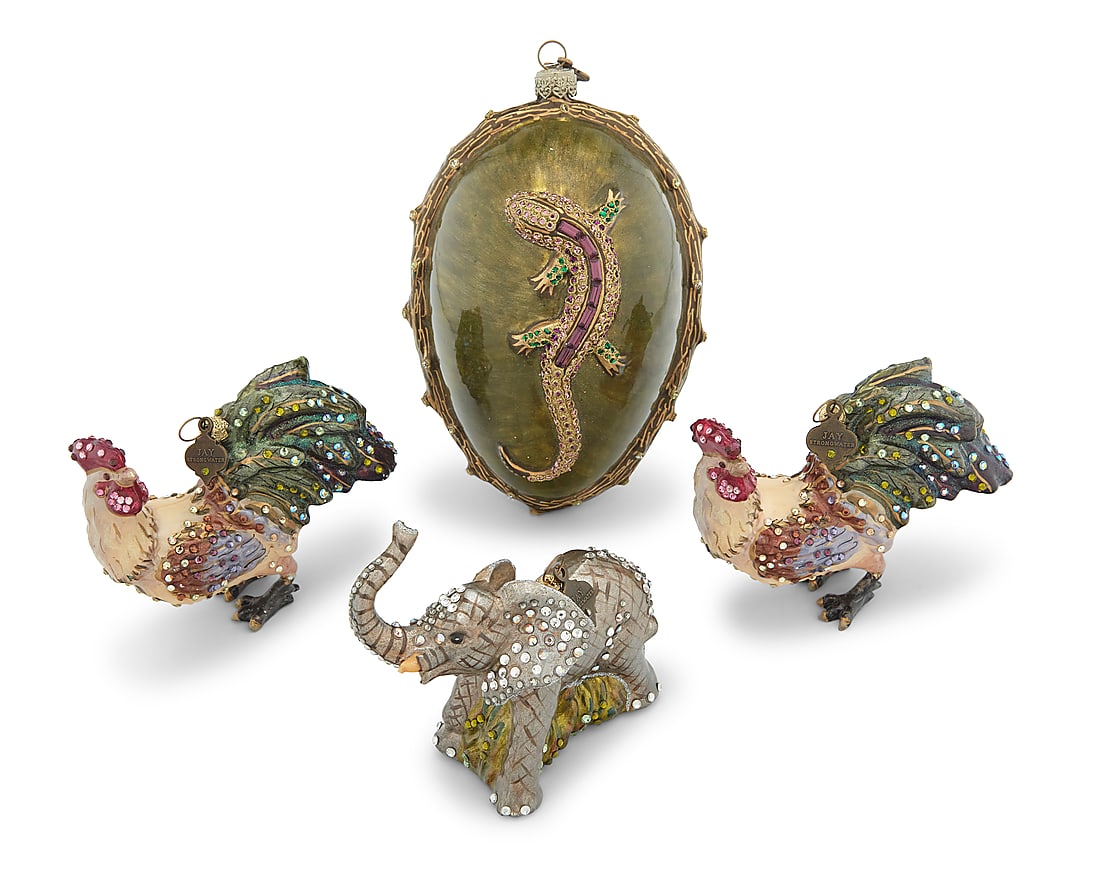 Four Jay Strongwater holiday ornaments: Four Jay Strongwater holiday ornaments Late 20th century Each with maker's applied metal tag Comprising an egg with lizard in relief, two roosters, and an elephant, each enameled and with inset cut
