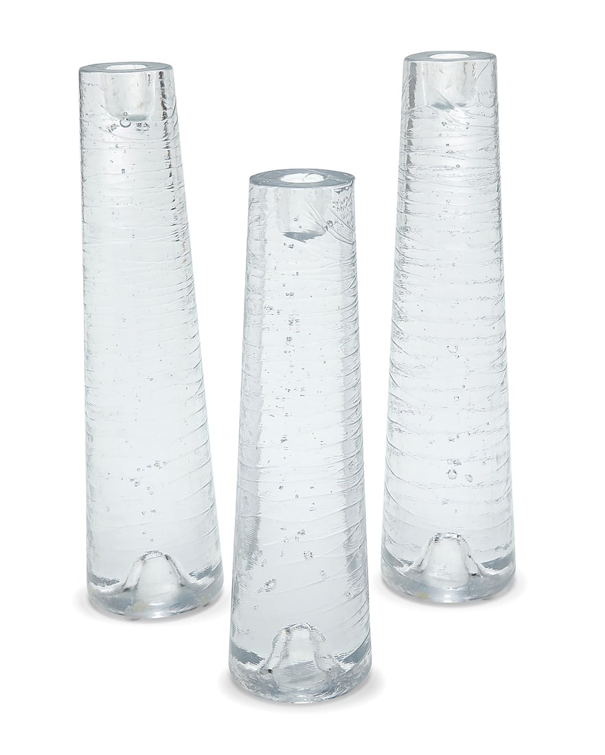 Anders Färdig (b. 20th century), A set of three glass 'Spear' candlesticks for Kosta Boda, early: Anders Färdig (b. 20th century) A set of three glass 'Spear' candlesticks for Kosta Boda, early 21st century One with factory label remnant 3 pieces Height of tallest 13 1/4 in., diameter 3 3/8 in.;
