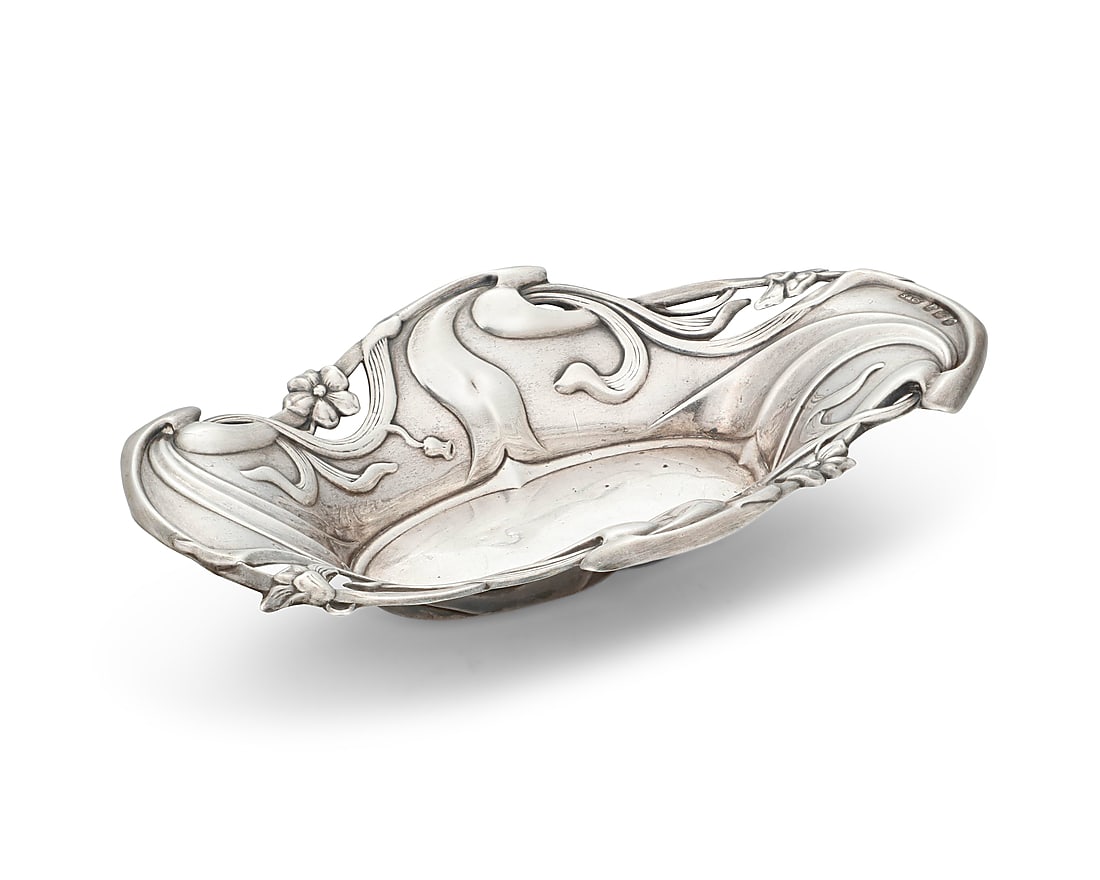 An English Art Nouveau sterling silver tray: An English Art Nouveau sterling silver tray 1907 With English hallmarks for sterling, Birmingham, date, and maker: S & Co. With openwork foliate rim Height 1 1/8 in., width 6 in., depth 3 5/8 in. 1.5