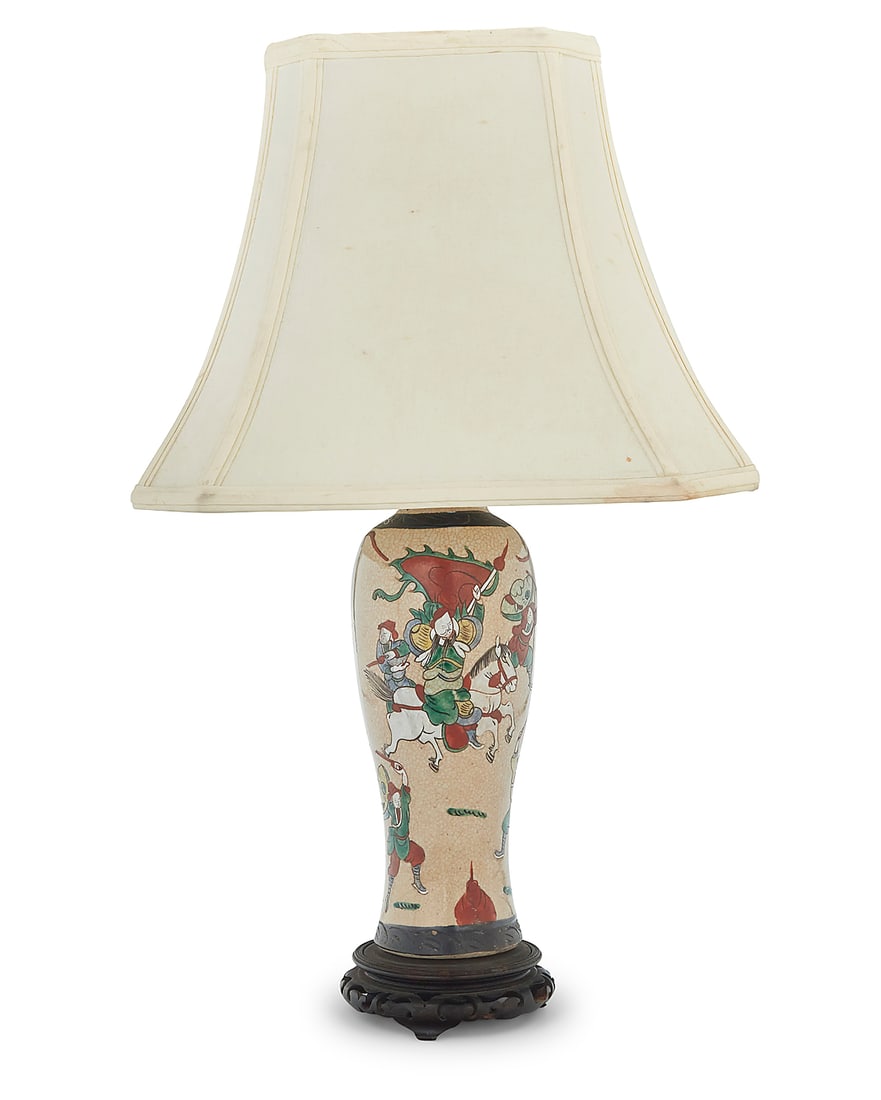 A Japanese crackle glaze ceramic vase as a lamp: A Japanese crackle glaze ceramic vase as a lamp 20th century Wood base impressed: HONOKOMO The vase painted with warrior figures, issuing two Leviton lights and raised on a carved wood base, surmounte