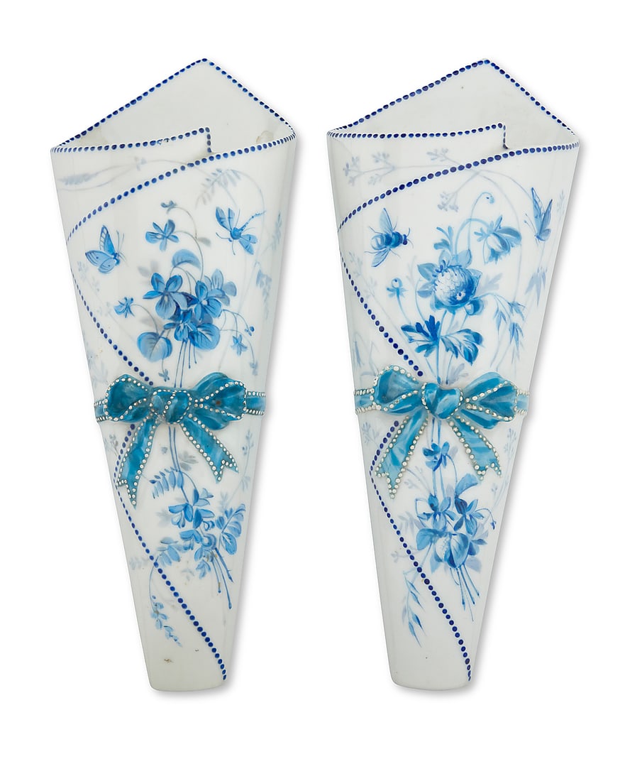 A near pair of Continental porcelain wall pockets/vases: A near pair of Continental porcelain wall pockets/vases Early/mid-20th century Each impressed verso: H.A. & Co. / 549 Hand-painted with flowers and insects 2 pieces Height of each 12 in., width 4 3/4 