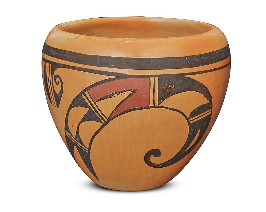 A Hopi polychrome yellowware pottery jar: A Hopi polychrome yellowware pottery jar Mid-20th century With red and black geometric motifs on cream slip ground Signed in slip to underside with undeciphered artist's flower and raincloud device