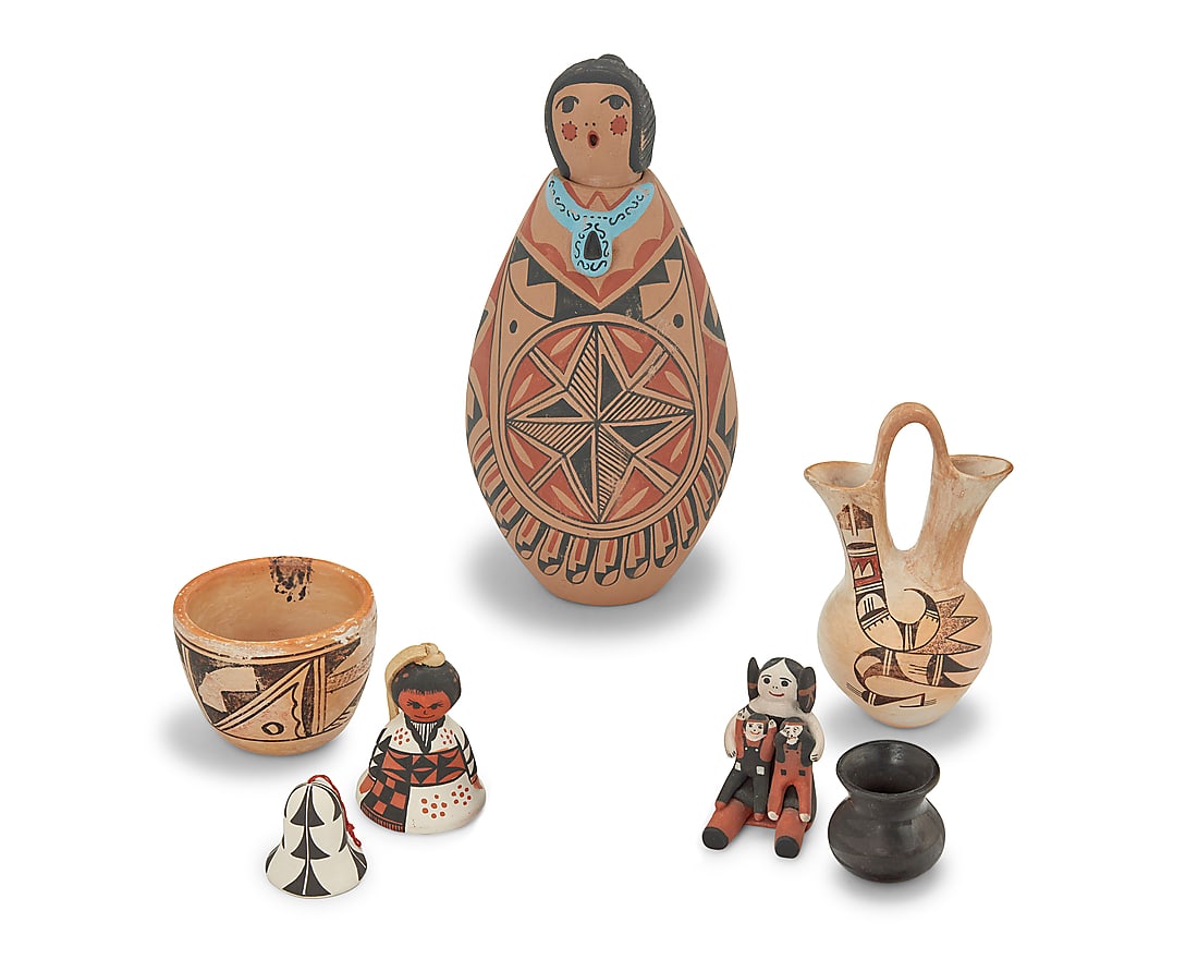Seven Pueblo or Southwest pottery items: Seven Pueblo or Southwest pottery items Seven works: Muriel Navasie (1954-1988, Hopi-Tewa) A polychrome wedding vase with red and brown geometric motifs on a cream slip ground Signed to underside: M.
