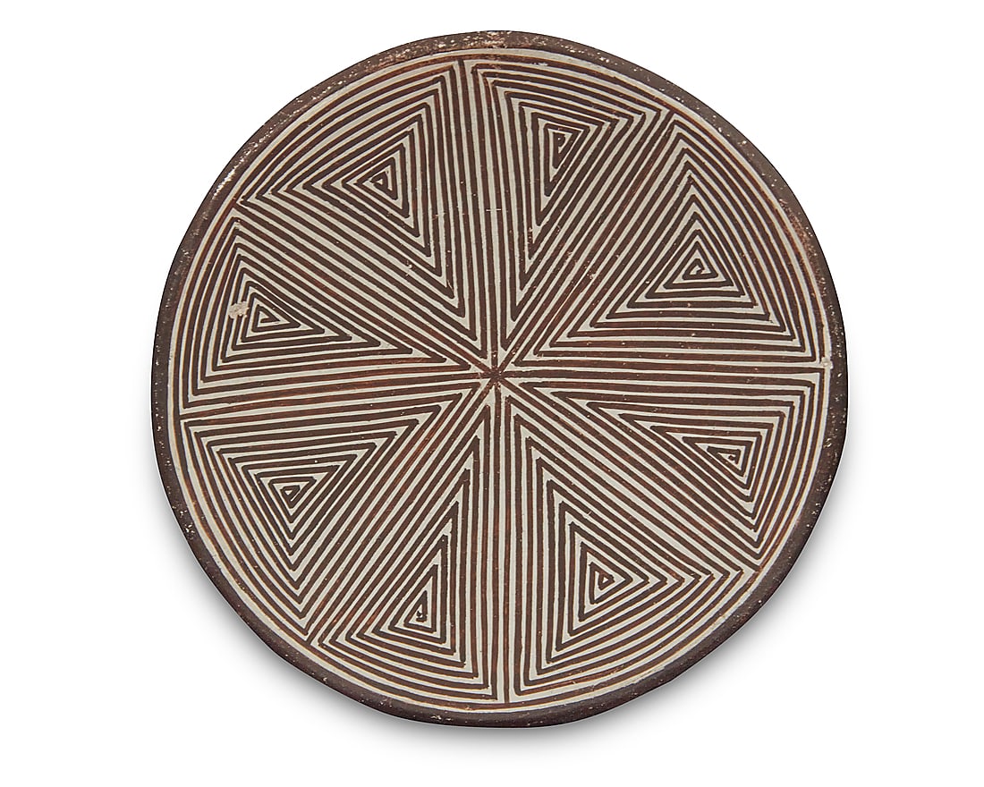 Lucy M. Lewis (1890-1992, Acoma Pueblo), A diminutive pottery tray: Lucy M. Lewis (1890-1992, Acoma Pueblo) A diminutive pottery tray Decorated with black fine-line geometric design on white slip ground Signed in slip to underside: Lucy M. Lewis / Acoma, N.M. Height